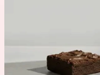 Waterloo Coffee sea salt brownie on a stone counter