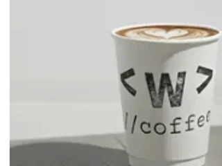 Waterloo Coffee Spanish Latte in a branded cup